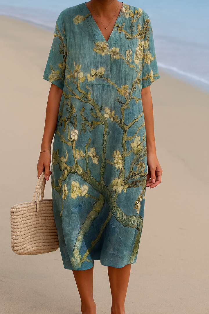 Gloria - Blue-green dress with floral print